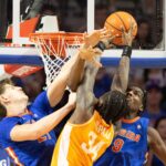 Rueben Chinyelu and Alex Condon block a shot by Felix Okpara.