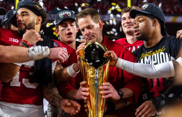 Indiana head coach Curt Cignetti with the Playoff trophy.