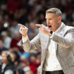 Coach Nate Oats.